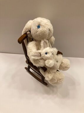Bunny and musical baby in a rocker